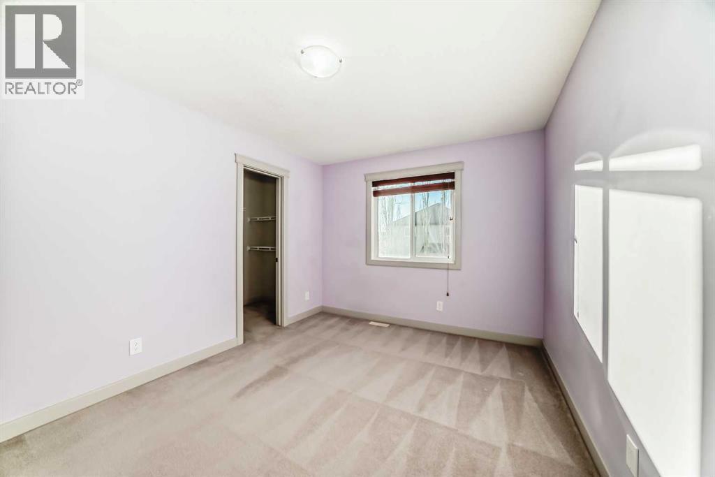 1156 Sherwood Boulevard Nw, Calgary, AB - Indoor Photo Showing Other Room