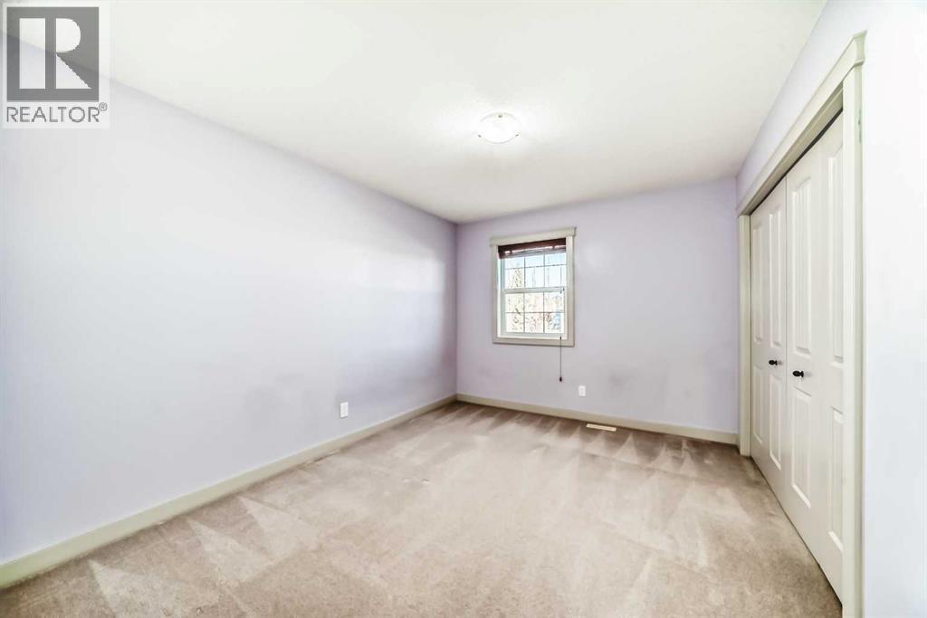 1156 Sherwood Boulevard Nw, Calgary, AB - Indoor Photo Showing Other Room