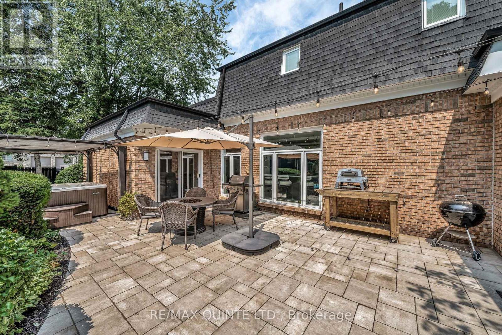 Patio with natural gas hookup, detailed interlock. - 22 Forest Hill Crescent, Belleville (Belleville Ward), ON - Outdoor With Deck Patio Veranda