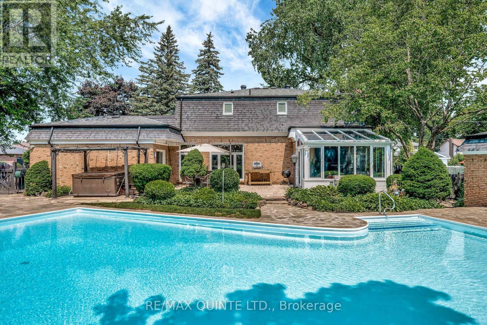 Your summer escape, newly landscaped pool. - 22 Forest Hill Crescent, Belleville (Belleville Ward), ON - Outdoor With In Ground Pool With Deck Patio Veranda