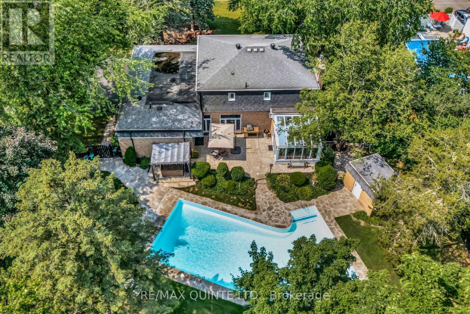 An entertainer's dream come to life. - 22 Forest Hill Crescent, Belleville (Belleville Ward), ON - Outdoor With In Ground Pool With Deck Patio Veranda