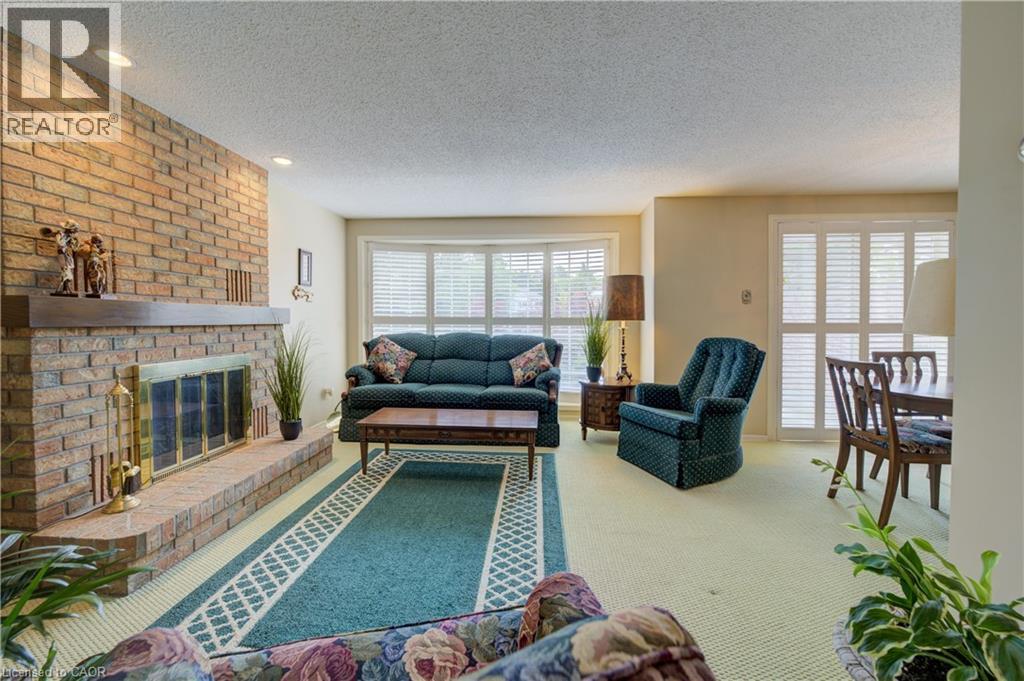 493 Beechwood Drive Unit# 4, Waterloo, ON - Indoor Photo Showing Living Room With Fireplace