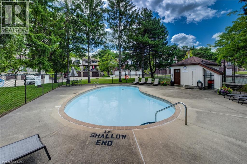 493 Beechwood Drive Unit# 4, Waterloo, ON - Outdoor With In Ground Pool