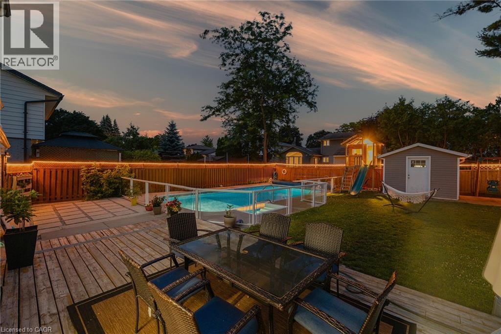 23 Dooley Drive, Kitchener, ON - Outdoor With In Ground Pool With Deck Patio Veranda