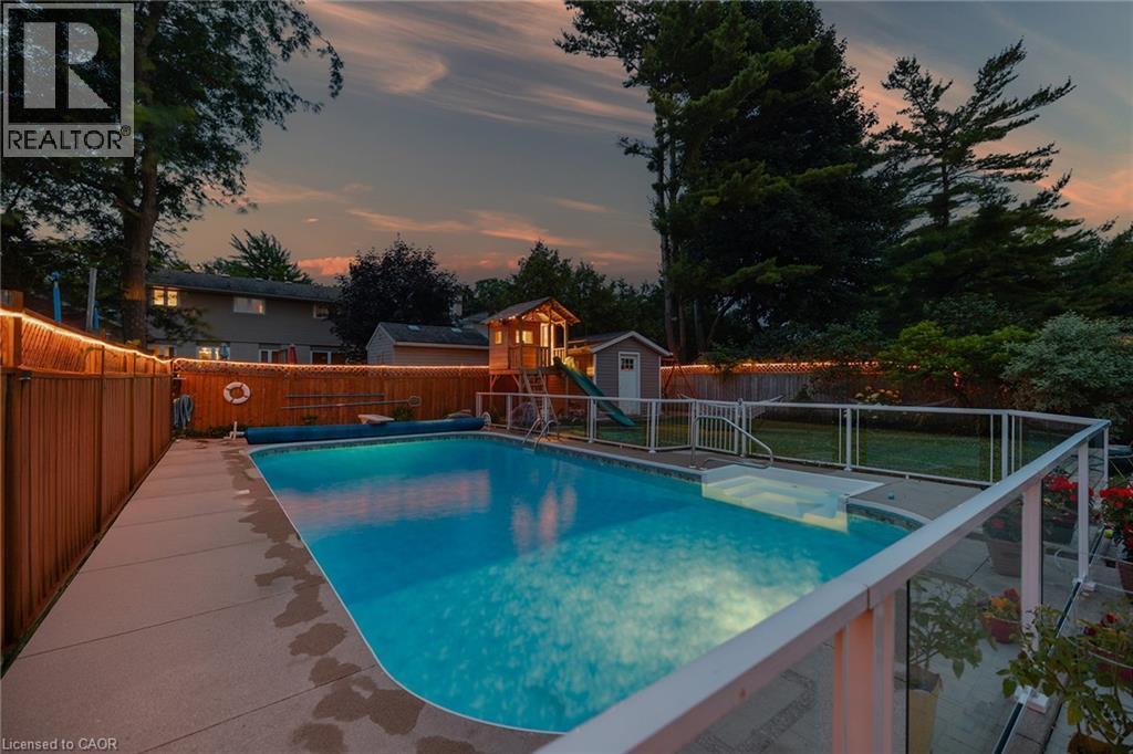 23 Dooley Drive, Kitchener, ON - Outdoor With In Ground Pool