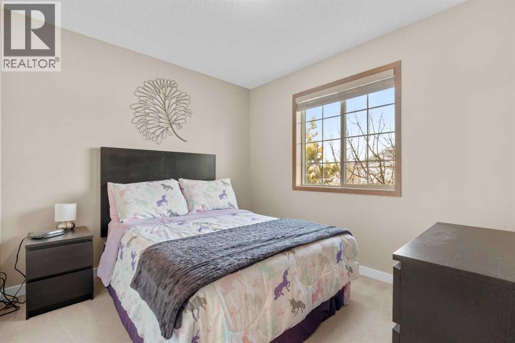 6 Easterbrook Place Se, Airdrie, AB - Indoor Photo Showing Bedroom
