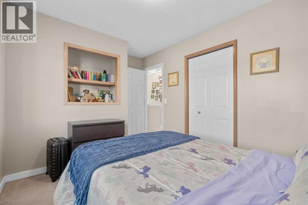 6 Easterbrook Place Se, Airdrie, AB - Indoor Photo Showing Bedroom