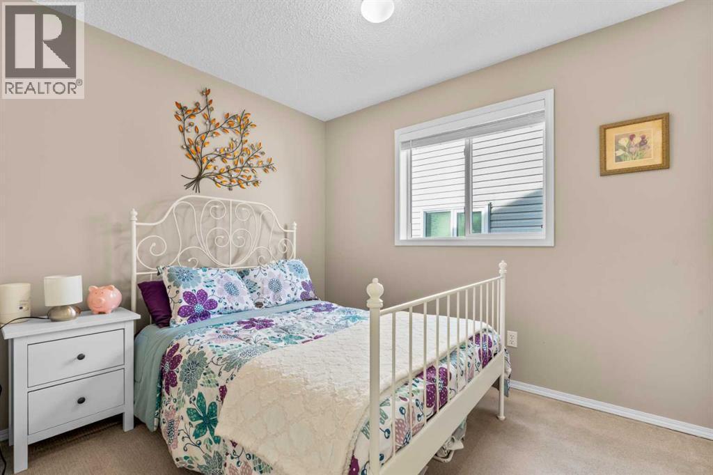 6 Easterbrook Place Se, Airdrie, AB - Indoor Photo Showing Bedroom
