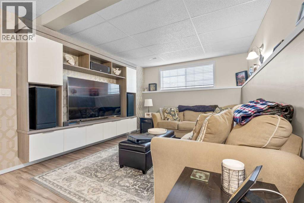 Recreation room in the basement - 6 Easterbrook Place Se, Airdrie, AB - Indoor