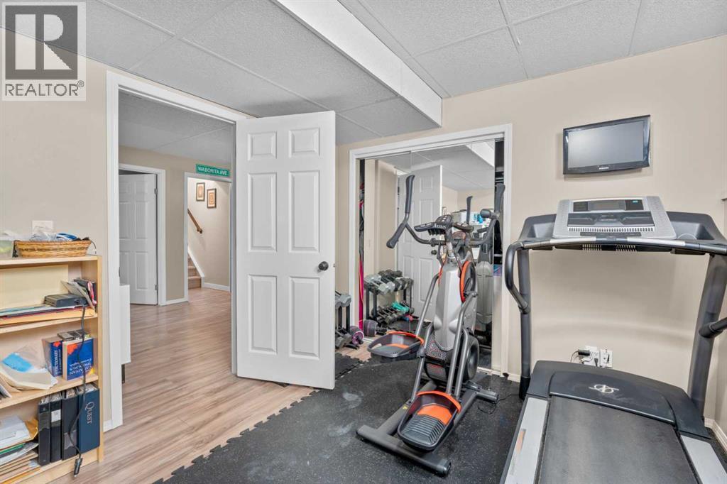 6 Easterbrook Place Se, Airdrie, AB - Indoor Photo Showing Gym Room