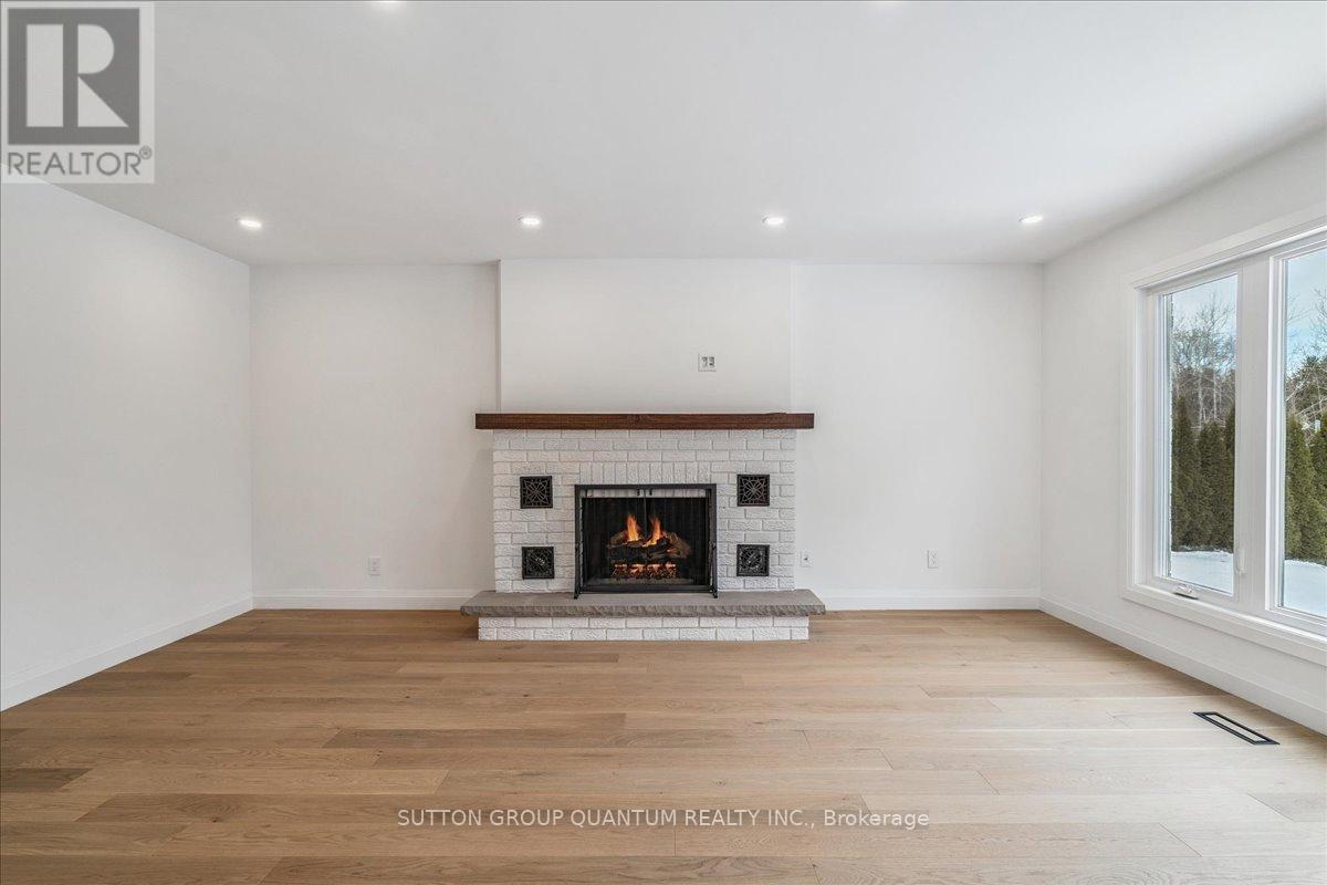 Family - 82 Marilyn Street, Caledon, ON - Indoor Photo Showing Other Room With Fireplace