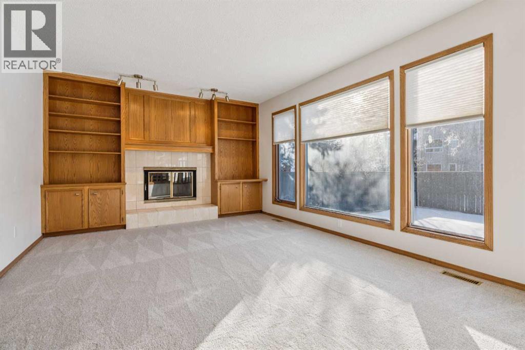 124 Edgebrook Road Nw, Calgary, AB - Indoor With Fireplace