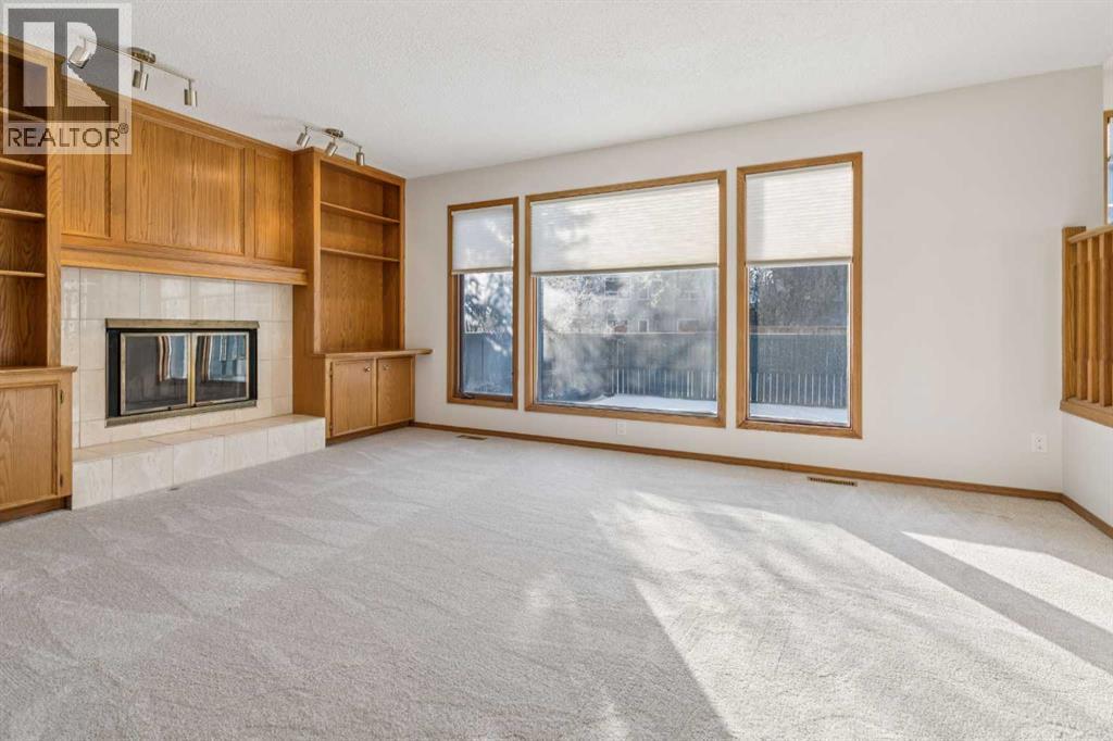 124 Edgebrook Road Nw, Calgary, AB - Indoor With Fireplace