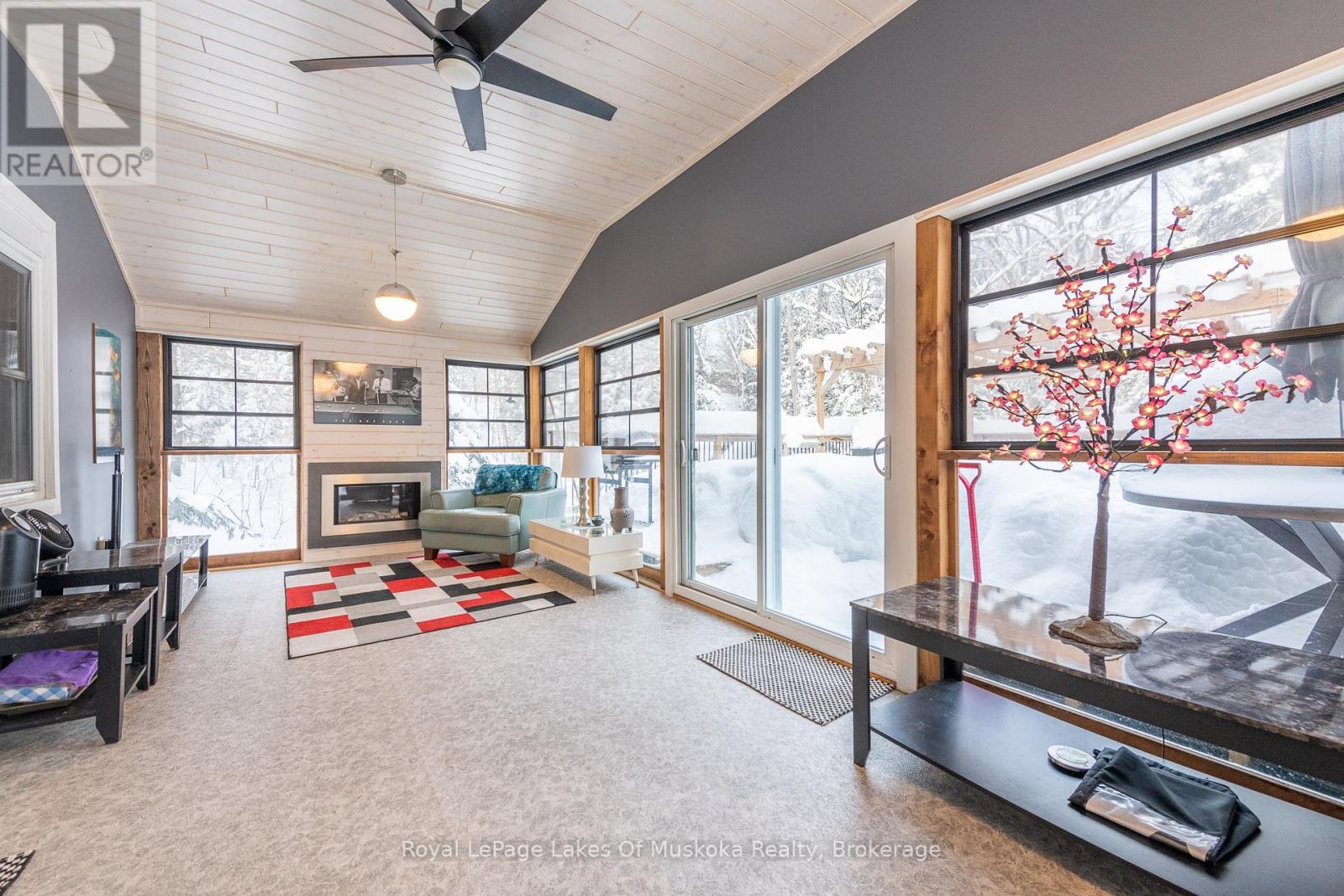 256 Woodland Drive, Huntsville (Chaffey), ON - Indoor With Fireplace