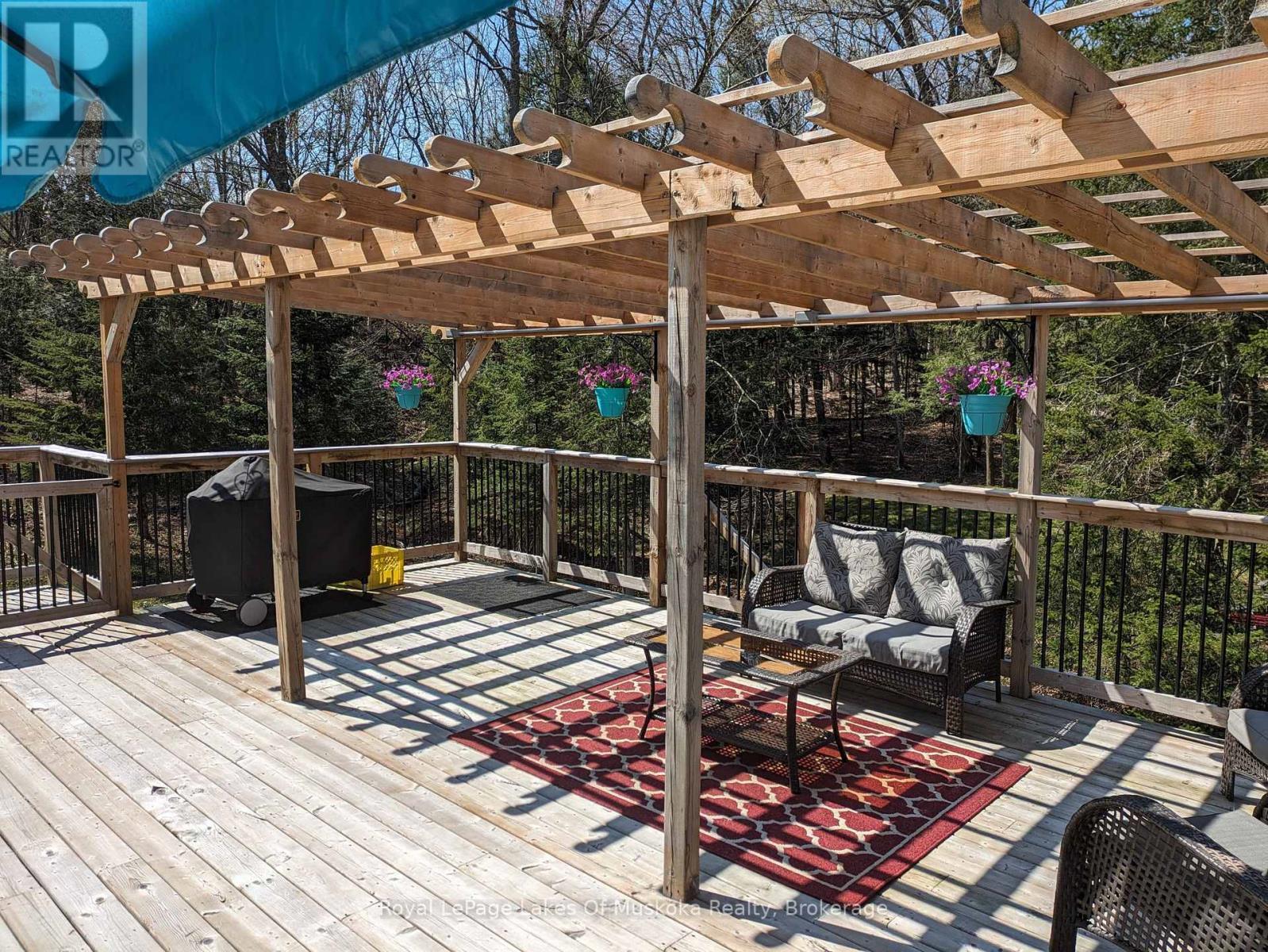 Owners photos of Deck - 256 Woodland Drive, Huntsville (Chaffey), ON - Outdoor With Deck Patio Veranda With Exterior