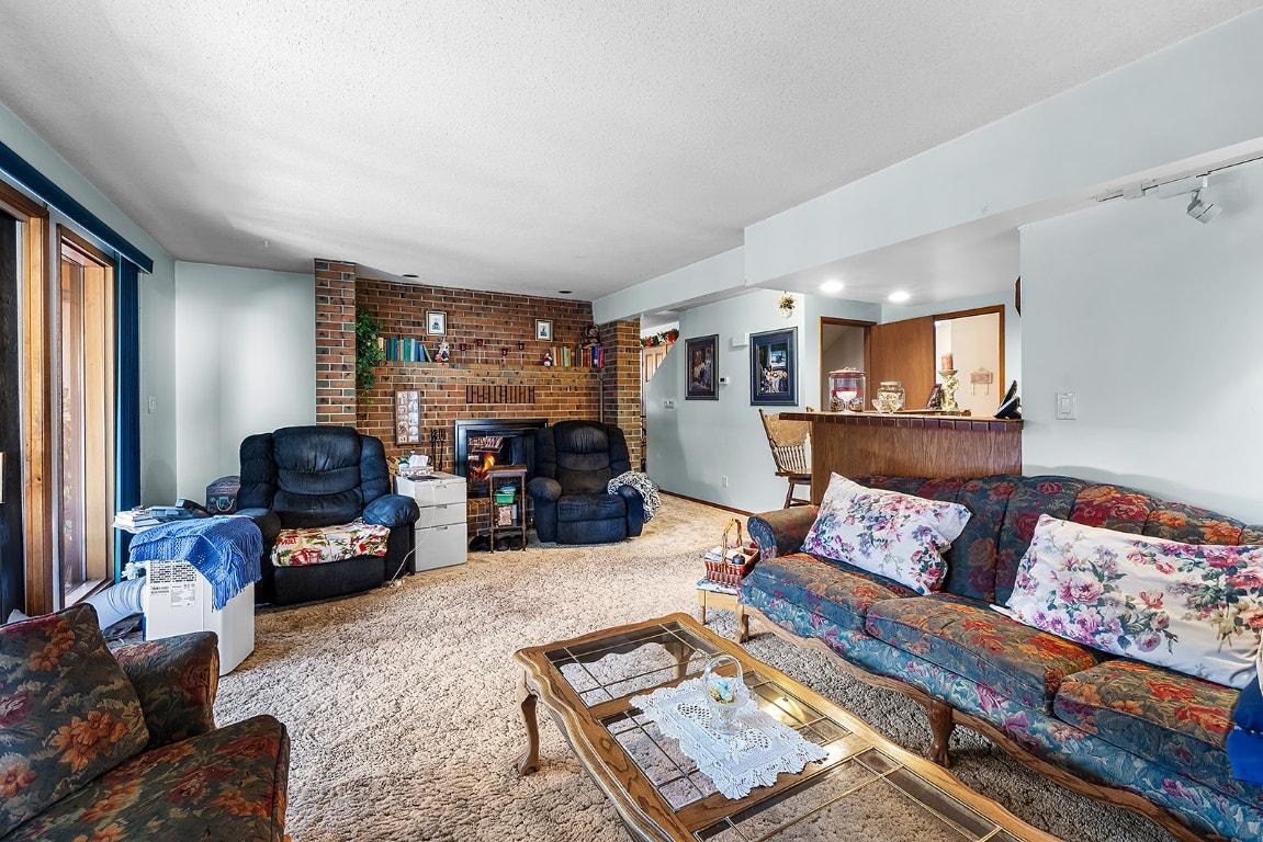 1804 13Th Avenue, Cranbrook, BC - Indoor Photo Showing Living Room With Fireplace