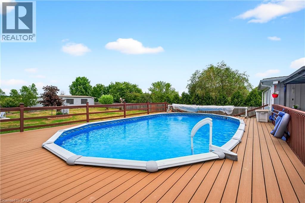 4265 Fly Road, Campden, ON - Outdoor With Above Ground Pool With Deck Patio Veranda With Backyard