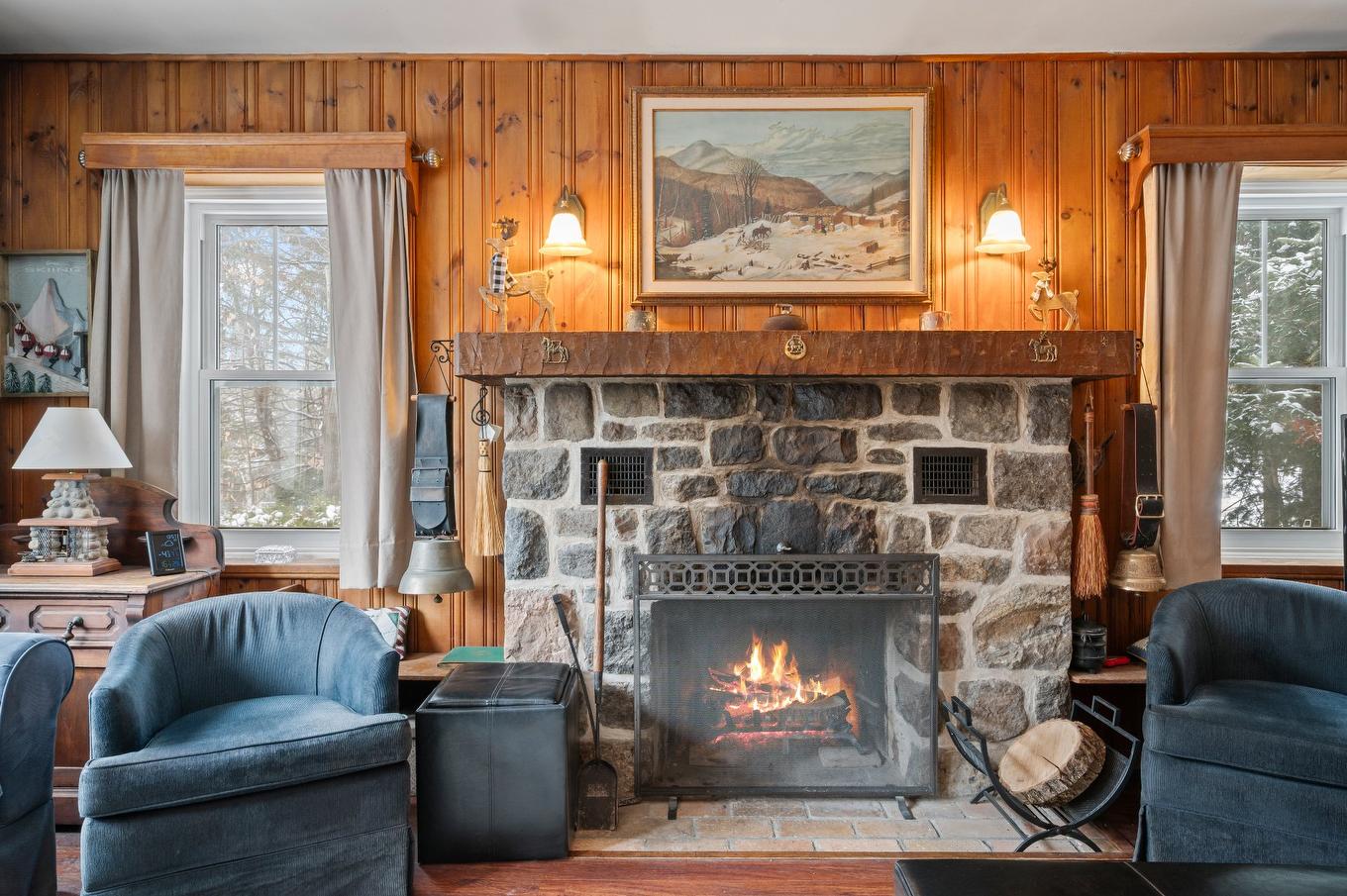 Living room - 233 Rue D'Aspen, Sainte-Adèle, QC - Indoor Photo Showing Living Room With Fireplace