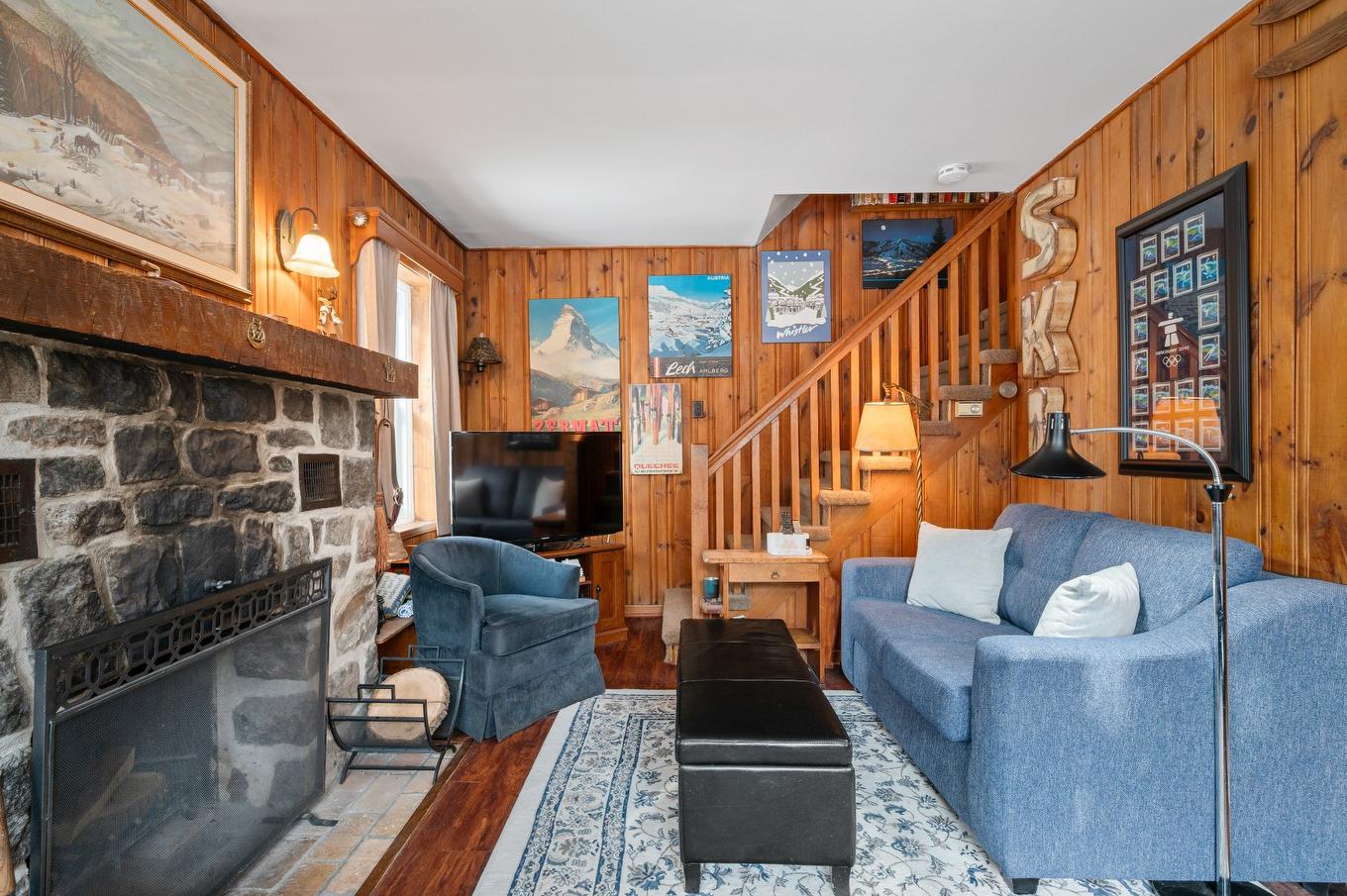 Living room - 233 Rue D'Aspen, Sainte-Adèle, QC - Indoor Photo Showing Living Room With Fireplace