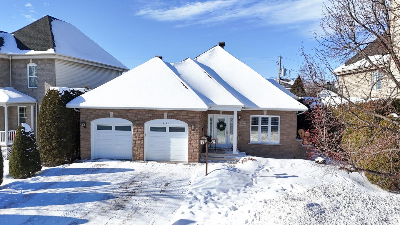 Aerial photo - 2353 Rue De L'Île-Des-Lys, Terrebonne (Lachenaie), QC - Outdoor With Facade
