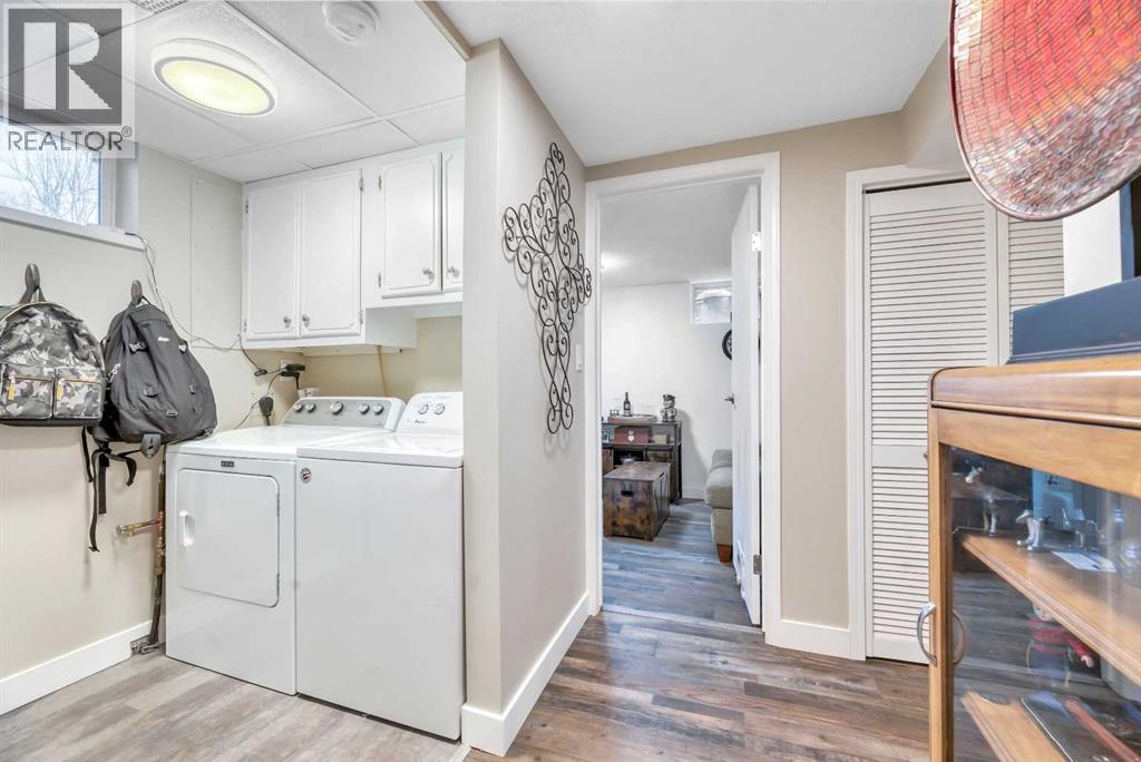 708 Allden Place Se, Calgary, AB - Indoor Photo Showing Laundry Room