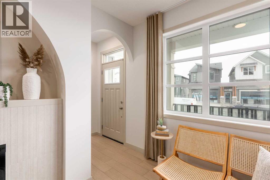 PLEASE NOTE: Photos are of a finished Showhome of the same model – fit and finish may differ on finished spec home. Interior selections and floorplans shown in photos - 129 Raven Link Se, Calgary, AB - Indoor Photo Showing Other Room