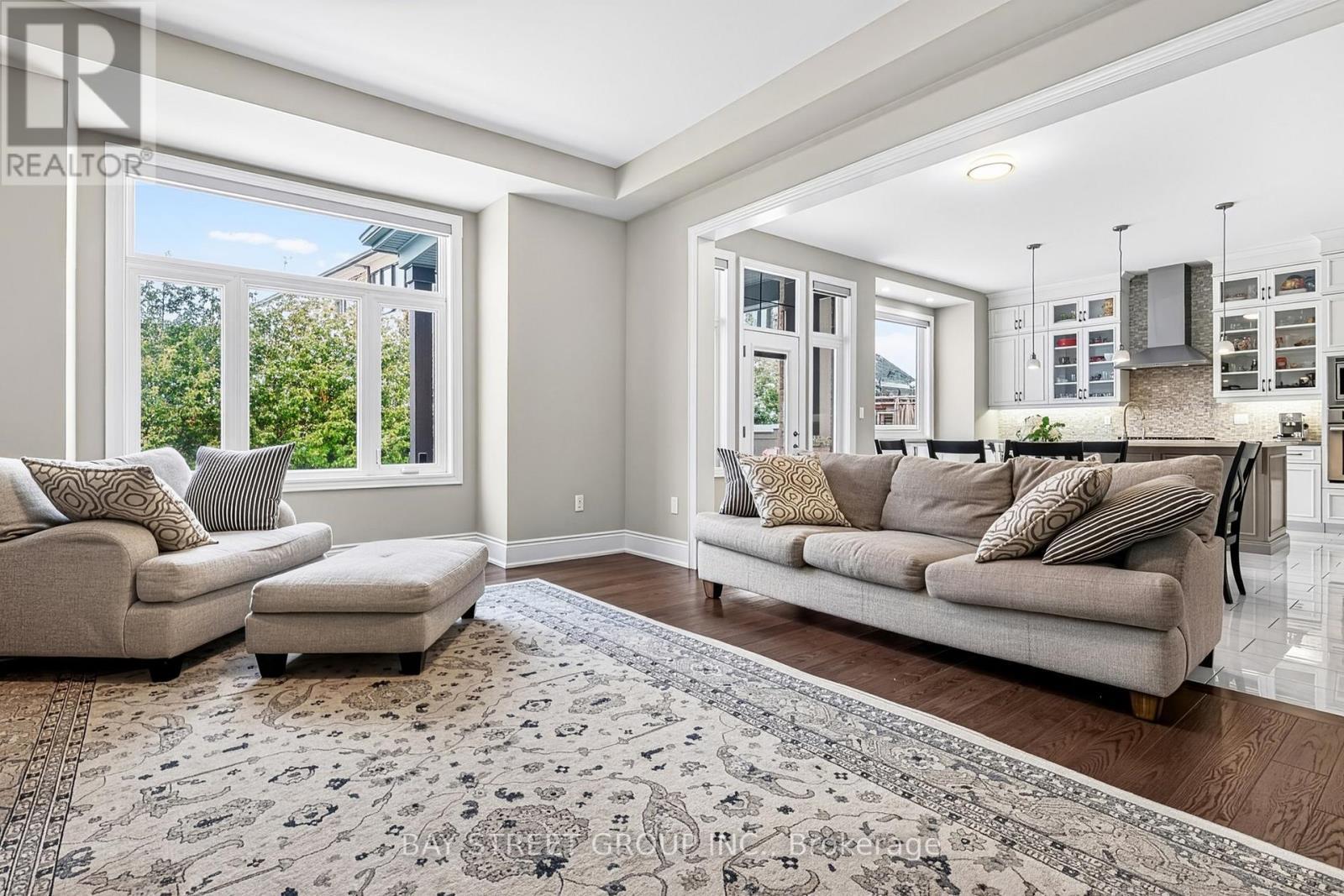 Bright Open Family Room With Oversized Windows - 39 Cairns Gate, King, ON - Indoor Photo Showing Living Room