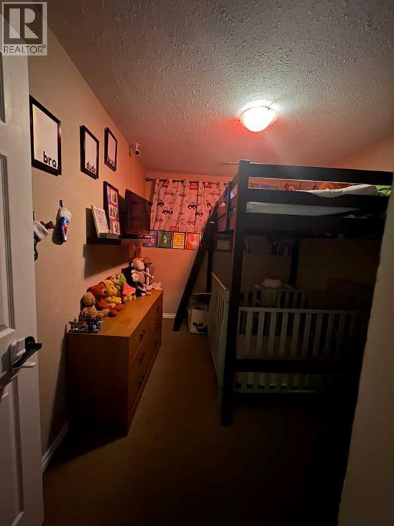 2, 1701 St Edward Boulevard N, Lethbridge, AB - Indoor Photo Showing Other Room