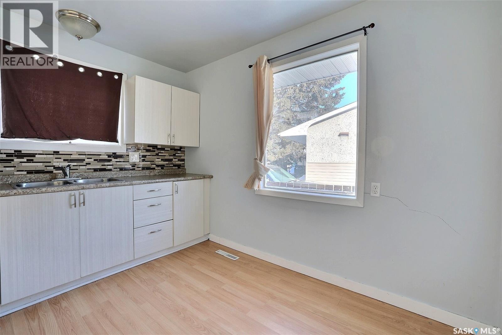 254 Froom Crescent, Regina, SK - Indoor Photo Showing Kitchen With Double Sink