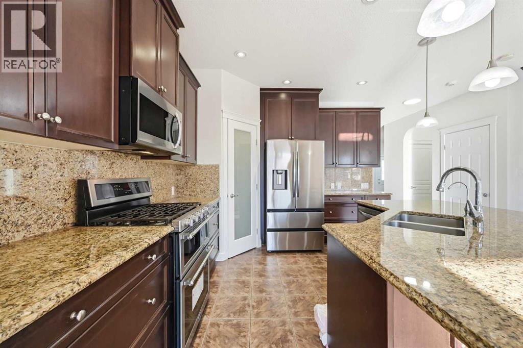 59 Redstone Park Ne, Calgary, AB - Indoor Photo Showing Kitchen With Stainless Steel Kitchen With Double Sink With Upgraded Kitchen