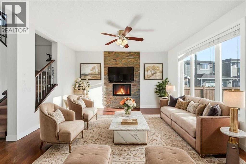 59 Redstone Park Ne, Calgary, AB - Indoor Photo Showing Living Room With Fireplace
