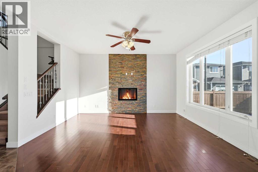 59 Redstone Park Ne, Calgary, AB - Indoor Photo Showing Living Room With Fireplace
