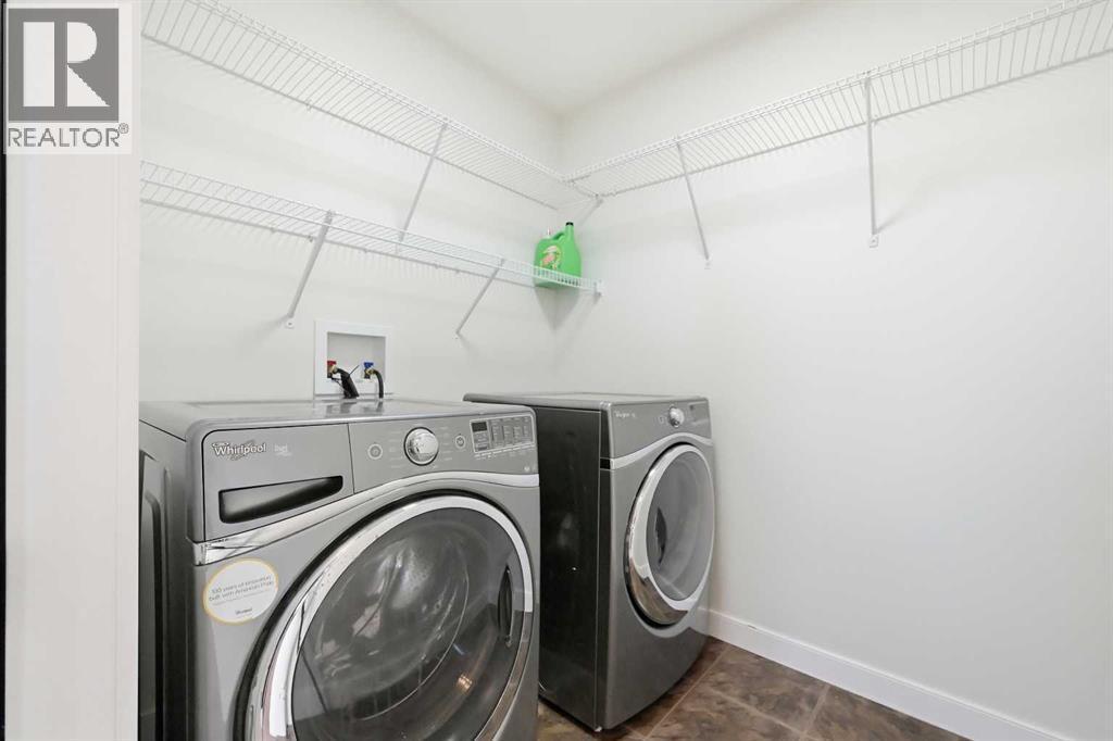 59 Redstone Park Ne, Calgary, AB - Indoor Photo Showing Laundry Room