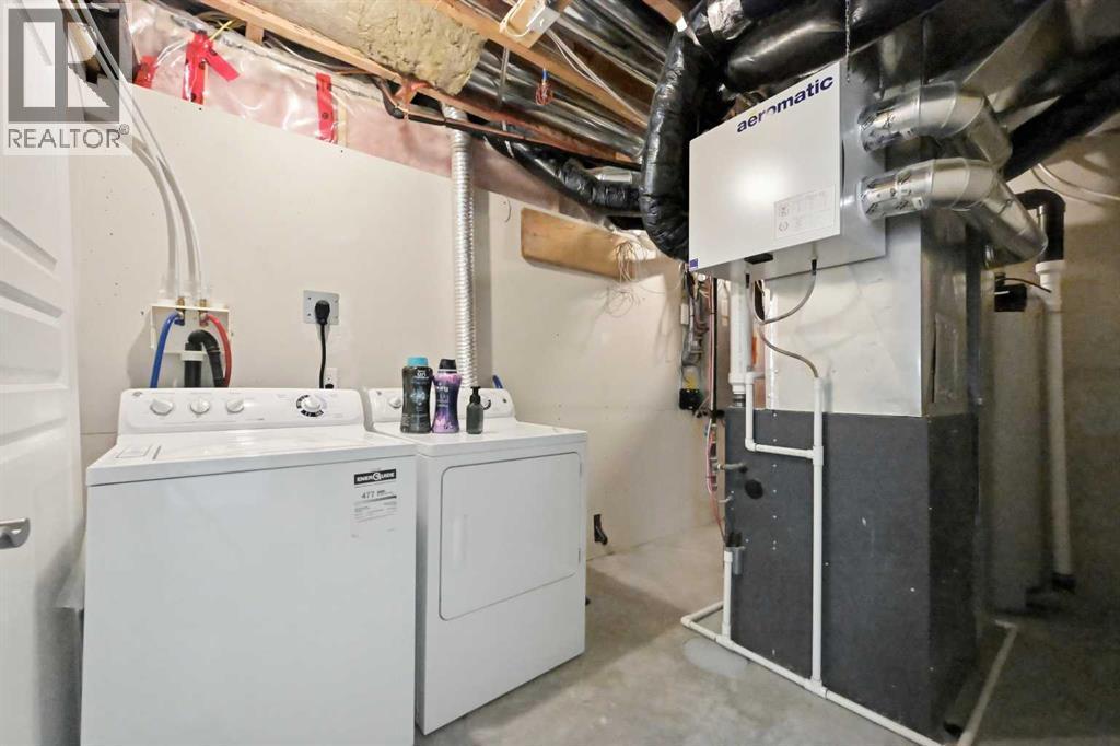 59 Redstone Park Ne, Calgary, AB - Indoor Photo Showing Laundry Room