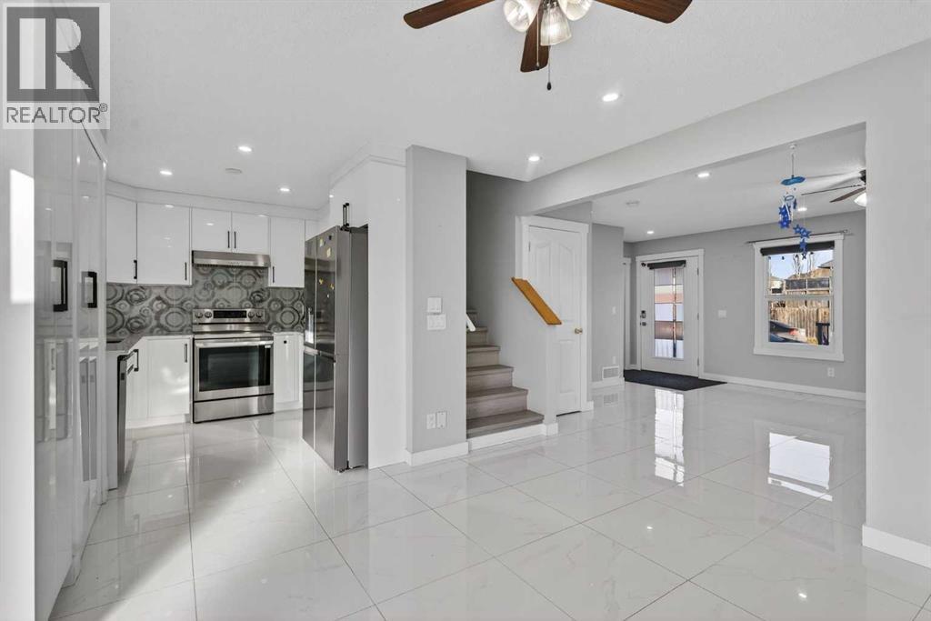 49 Taravista Way Ne, Calgary, AB - Indoor Photo Showing Kitchen With Upgraded Kitchen