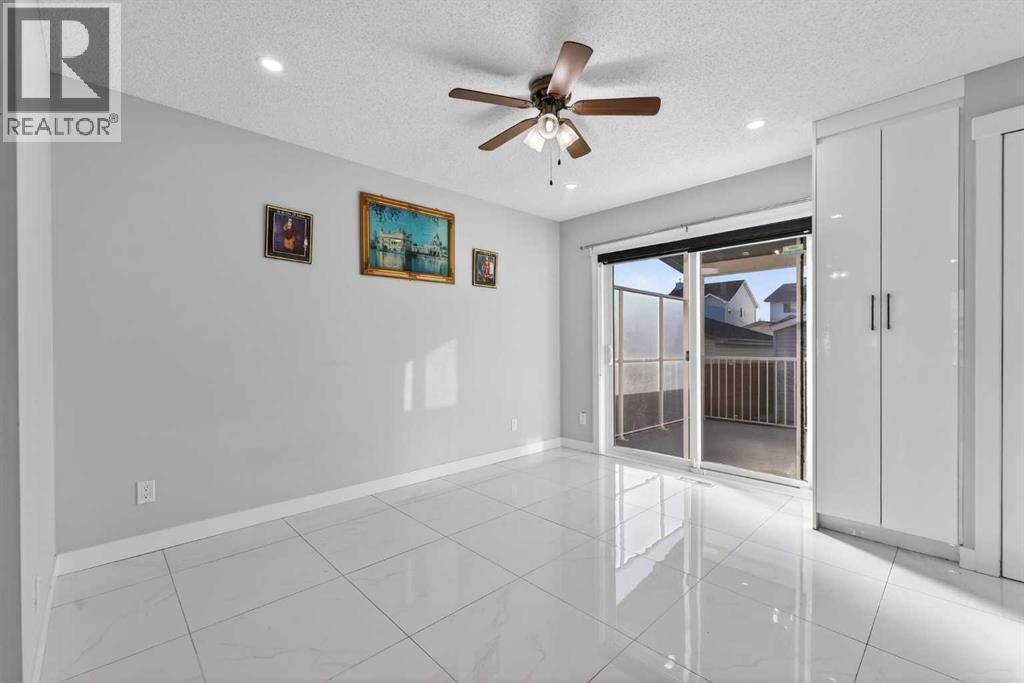 49 Taravista Way Ne, Calgary, AB - Indoor Photo Showing Other Room