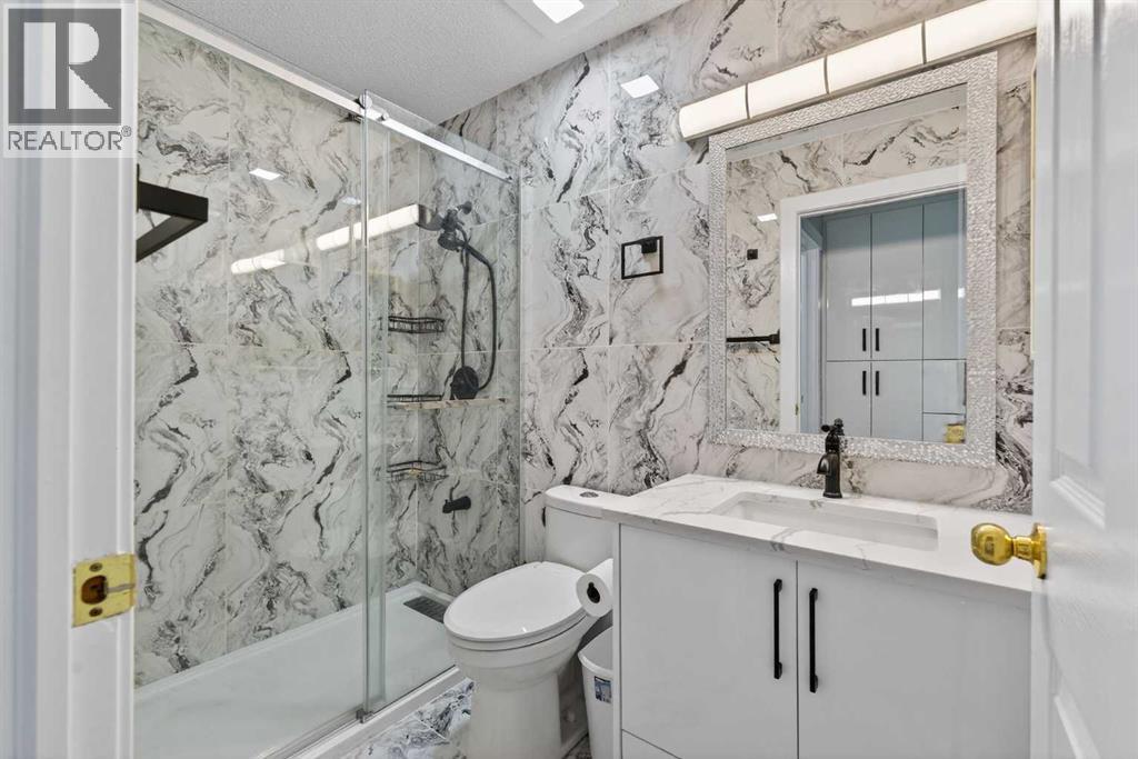 49 Taravista Way Ne, Calgary, AB - Indoor Photo Showing Bathroom