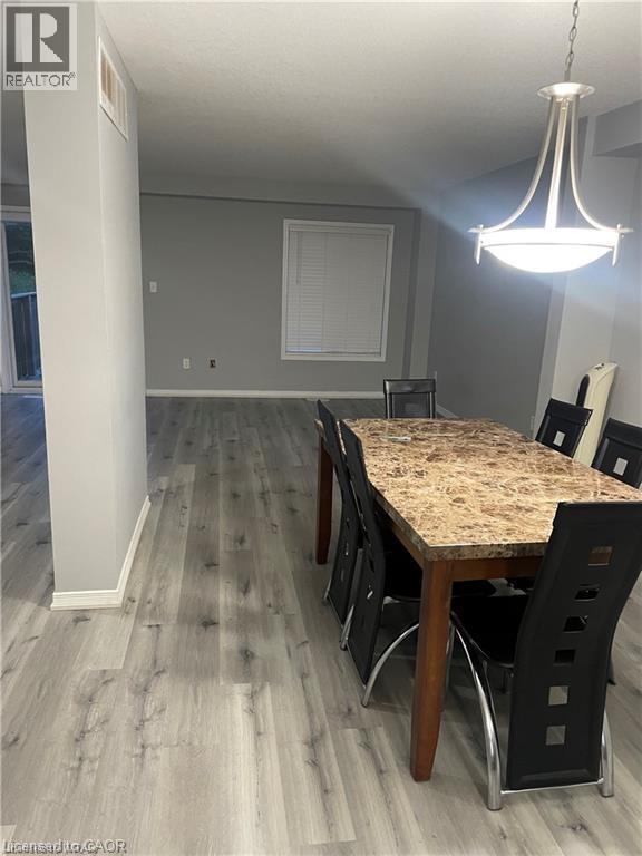Dining room featuring light wood-style flooring - 198 Maitland Street, Kitchener, ON - Indoor Photo Showing Dining Room