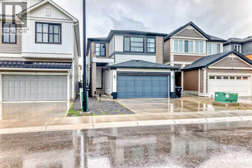 54 Seton Manor Se, Calgary, AB - Outdoor With Facade