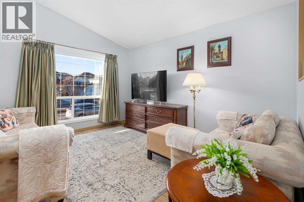 118 Bridleridge Way Sw, Calgary, AB - Indoor Photo Showing Living Room