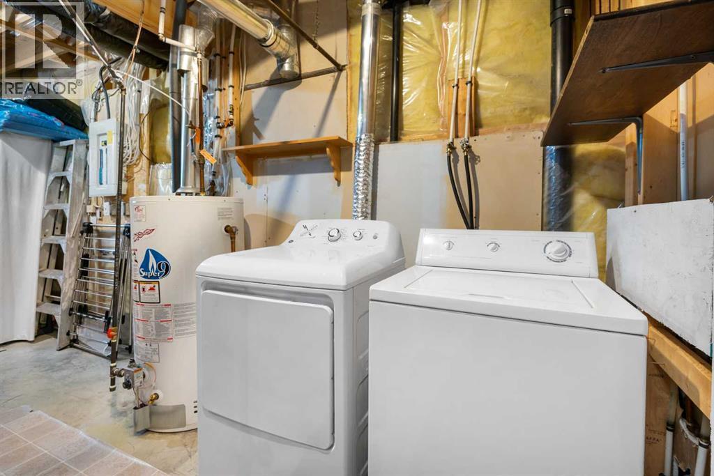 118 Bridleridge Way Sw, Calgary, AB - Indoor Photo Showing Laundry Room