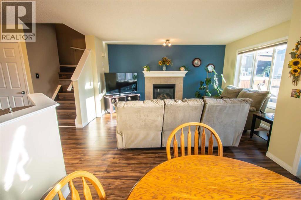 11 Saddlebrook Mews Ne, Calgary, AB - Indoor With Fireplace