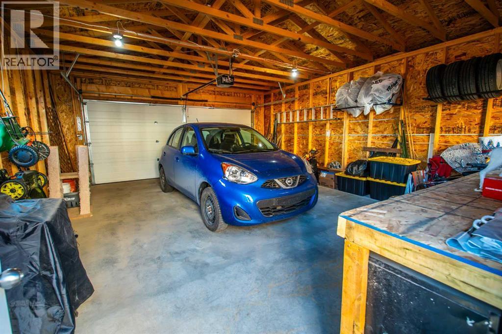 11 Saddlebrook Mews Ne, Calgary, AB - Indoor Photo Showing Garage
