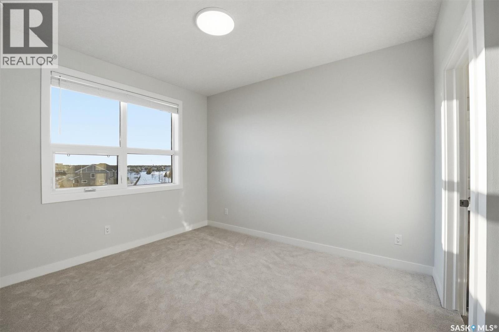 1303 101 Secord Way, Saskatoon, SK - Indoor Photo Showing Other Room