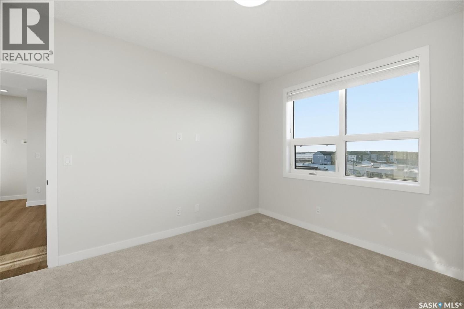 1303 101 Secord Way, Saskatoon, SK - Indoor Photo Showing Other Room