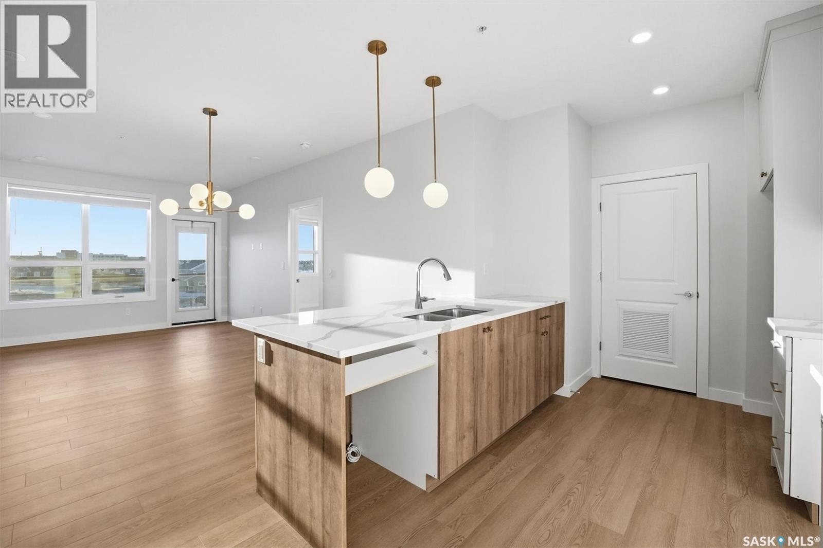 1303 101 Secord Way, Saskatoon, SK - Indoor Photo Showing Kitchen With Double Sink