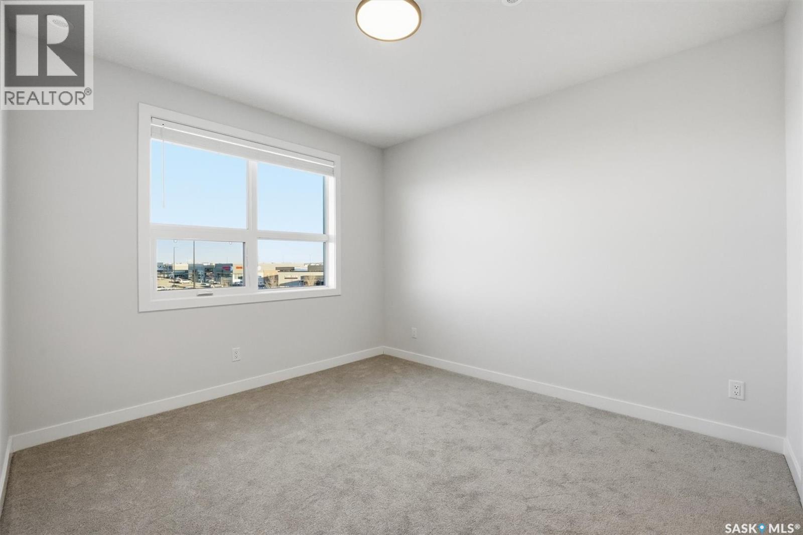 1304 101 Secord Way, Saskatoon, SK - Indoor Photo Showing Other Room