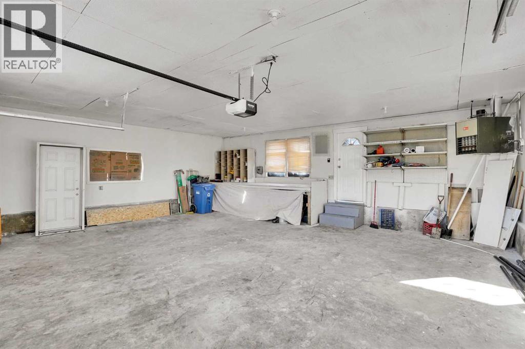 6060 Madigan Drive Ne, Calgary, AB - Indoor Photo Showing Garage