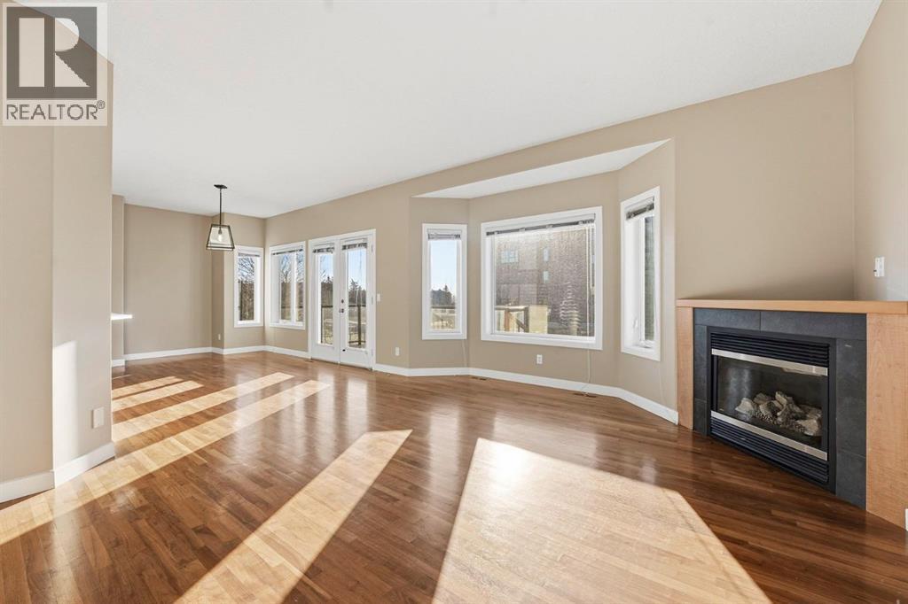 33 Prominence Park Sw, Calgary, AB - Indoor With Fireplace