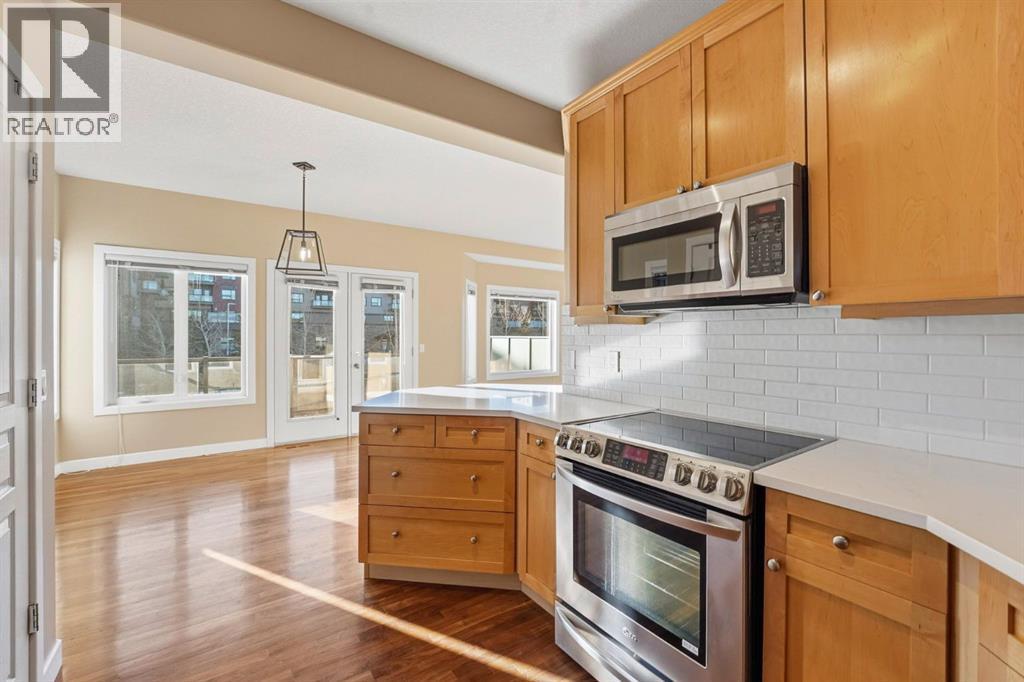 33 Prominence Park Sw, Calgary, AB - Indoor Photo Showing Kitchen With Stainless Steel Kitchen